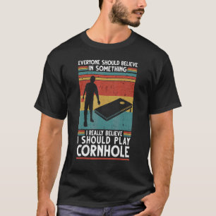 Camiseta Todos Eu Acredito Eu Jogo Cornhole Jogador de Corn
