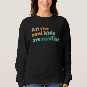 Camiseta Todos os Miúdos Fixes Estão a Ler o Livro do Dia