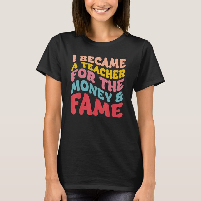 Camiseta Tornei-Me Professora Do Dinheiro E Da Fama (Frente)