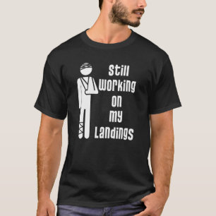 Camiseta Trabalhando Em Minhas aterrissagens Perna Quebrada