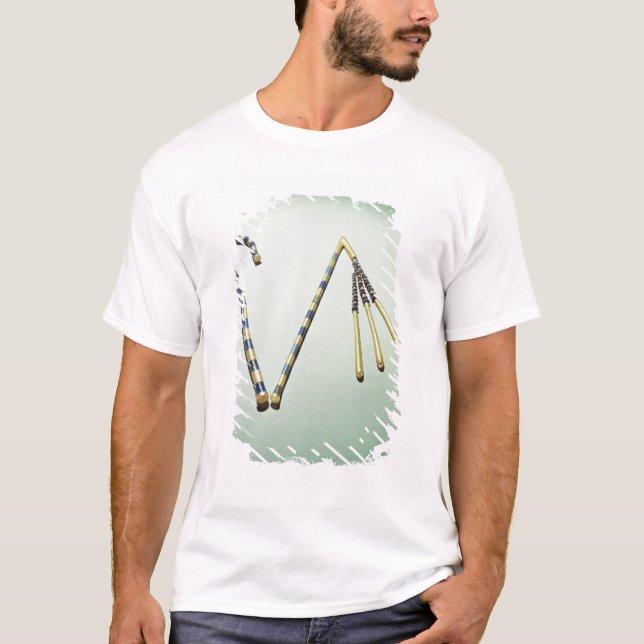 Camiseta Trapaceiro e flail, do túmulo de Tutankhamun (Frente)