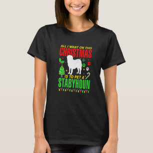 Camiseta Tudo O Que Quero Neste Natal É Pôr Um Esfaqueado.