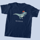 Camiseta Tyrannosaurus Rex Christmas Santa Hat Personalizad<br><div class="desc">Um dinossauro tiranossauro divertido vestindo um chapéu de Natal para Papai Noel,  com um nome de fonte moderno que pode ser mudado para personalizar. Arte original de Nic Squirrell.</div>