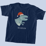 Camiseta Tyrannosaurus Rex Christmas Santa Hat Personalizad<br><div class="desc">Um dinossauro tiranossauro divertido vestindo um chapéu de Natal para Papai Noel,  com um nome de fonte moderno que pode ser mudado para personalizar. Arte original de Nic Squirrell.</div>