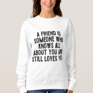 Camiseta Um amigo é alguém que sabe tudo sobre você e ain