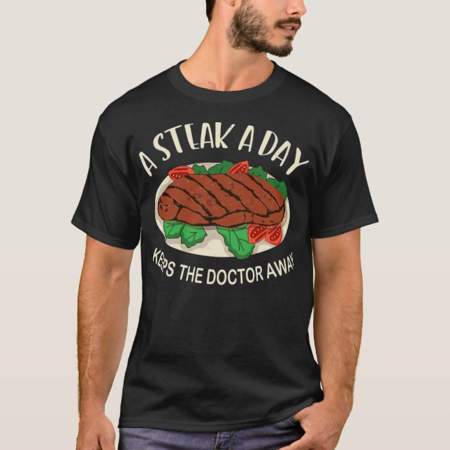 Camiseta Um bife por dia mantém o médico afastado (1) (Frente)