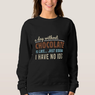 Camiseta Um Dia Sem Chocolate É Como Brincar.