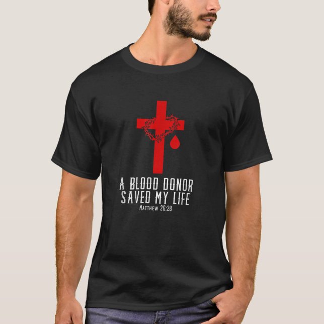 Camiseta Um Doador De Sangue Salvou Minha Bíblia Cristã Ver (Frente)
