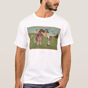 Camiseta Um EasterKids alegre que guardara um coelho