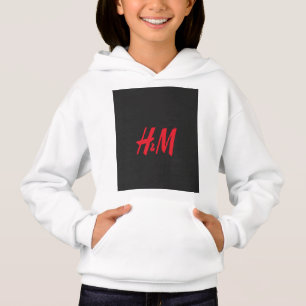 Camiseta um logotipo vermelho h e m em um fundo preto