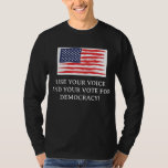 Camiseta Use your voice and vote<br><div class="desc">This long sleeve black shirt includes the US Flag and reminds you to use your voice to vote.</div>