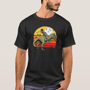 Camiseta Vaqueira Rodeio Montando Tiranossauro Rex Din Vint