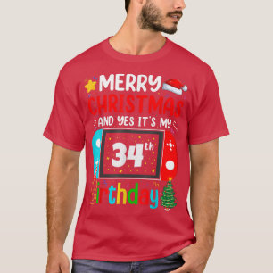 Camiseta Vídeo Jogo Feliz Natal Sim É o meu 34º 