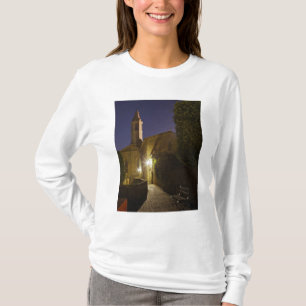 Camiseta Vista noturna da igreja ao anoitecer, Pienza, Itál