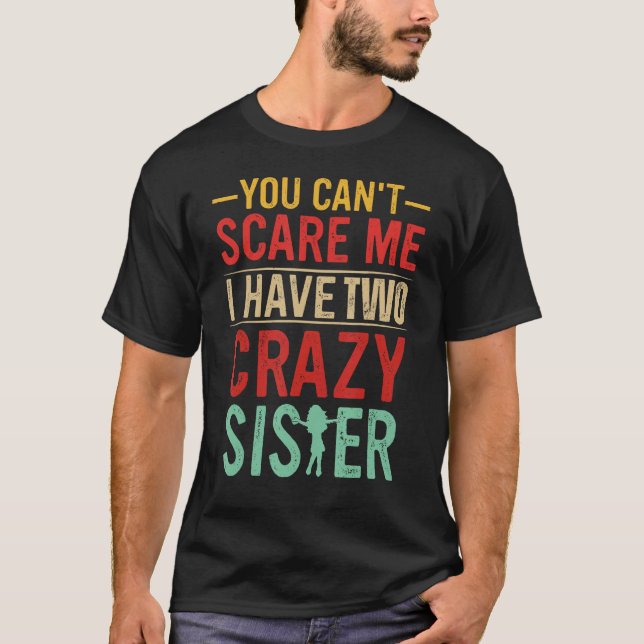Camiseta Você não pode me assustar Eu tenho duas irmãs malu (Frente)