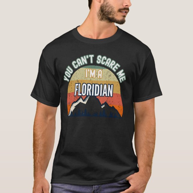Camiseta Você não pode me assustar. Sou um Presente Floridi (Frente)