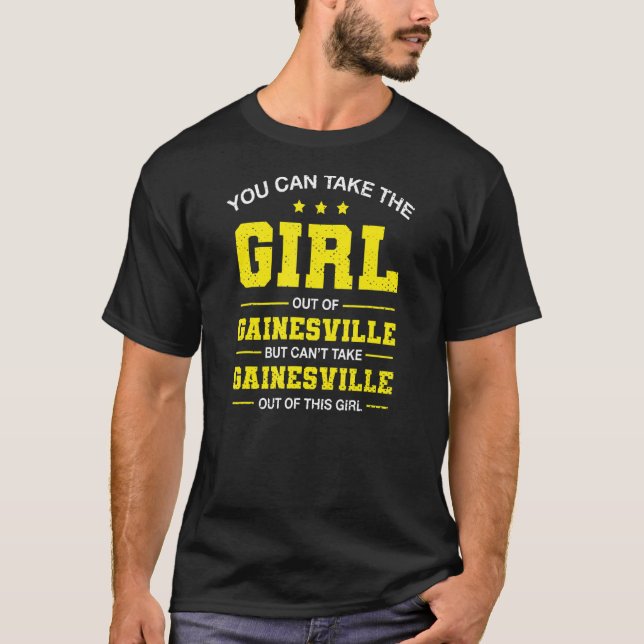 Camiseta Você Pode Tirar A Garota De Gainesville Florida G (Frente)