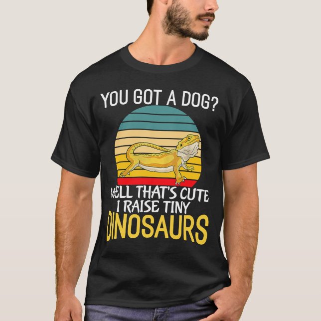 Camiseta Você tem um Cachorro Eu Levanto Dinossauros Pequen (Frente)
