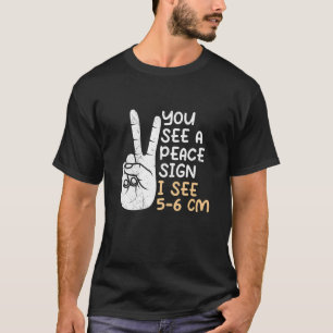 Camiseta Você vê um sinal de paz, eu vejo 5 6 cm de parteir