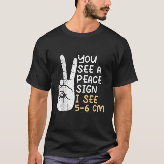 Camiseta Você vê um sinal de paz, eu vejo 5 6 cm de parteir