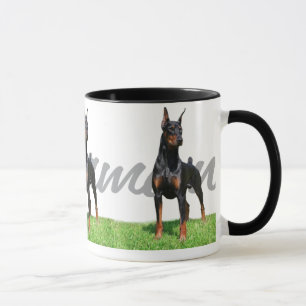 Caneca 3 Pinschers pretos do Doberman com o gráfico do