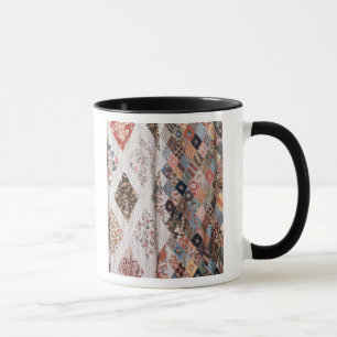 Caneca 53: Detalhe de uma edredão de retalhos feita pela