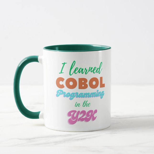 Caneca Aprendi a Linguagem Cobol no Y2K (Ano 2000) (Esquerda)