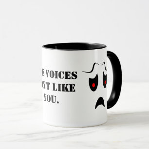 Caneca As vozes não gostam de você.