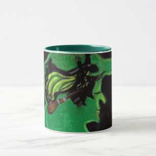 CANECA ASSISTENTE DE OZ VOANDO MAL-VESTIDO