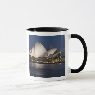 Caneca Austrália, Sydney. Casa da Ópera à noite em
