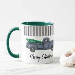 Caneca azul do caminhão da árvore de Natal do
