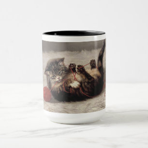 Caneca Berço de Gato, Um Gato Brincando com Novelo de Lã