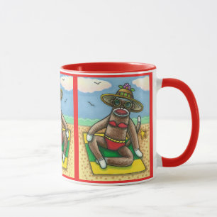 CANECA BICHETE VERMELHO DE MACACO, NA PRAIA DE CARTOON, 