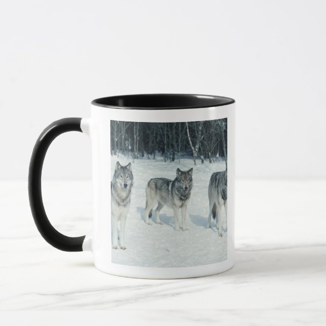 Caneca Bloco dos lobos na borda da floresta nevado (Esquerda)