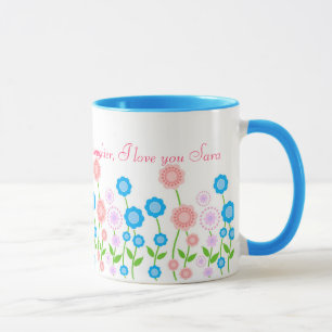 Caneca bonita das flores para a filha