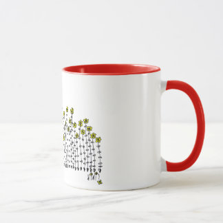Caneca bonito com bebé em um campo das flores