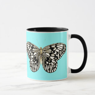 Caneca Borboleta branca e preta, fundo de turquesa