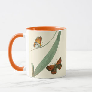 Caneca Borboletas coloridas flutuando em torno de uma fol