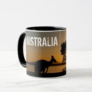 Caneca Canguru preto no pôr do sol na Austrália