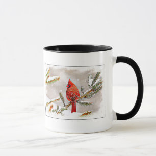 Caneca Cardeal em um pinheiro no inverno