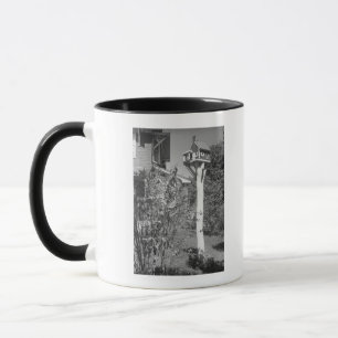 Caneca Casa do pássaro no jardim