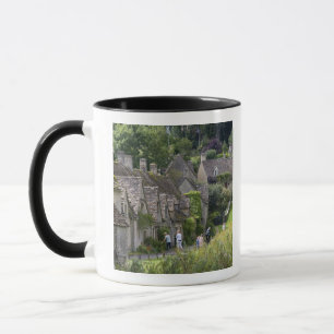 Caneca casas de pedra Cotswold na aldeia de