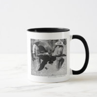 Cavalos de marcagem com ferro quente com a marca
