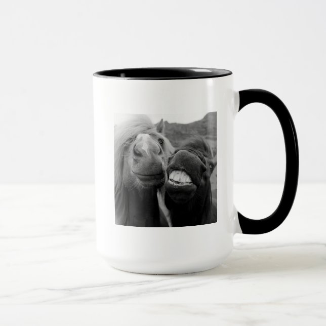 Caneca Cavalos de sorriso das imagens | de Getty (Direita)