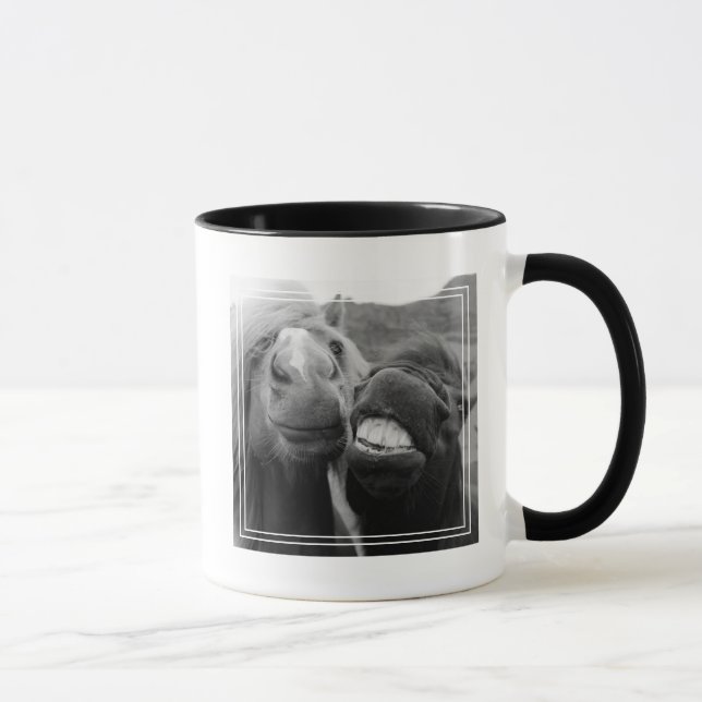 Caneca Cavalos de sorriso das imagens | de Getty (Direita)