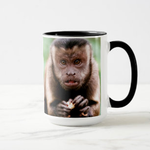 Caneca Close-up de um macaco capuchinho de cabeça preta