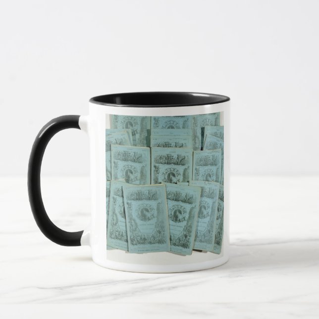 Caneca Cobrir das introduções mensais 'de pouco Dorrit (Esquerda)