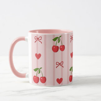 Caneca com laços vermelhos e cerejas