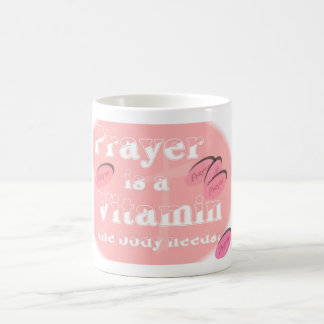 Caneca (cor-de-rosa) da oração da vitamina