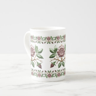 Caneca cor-de-rosa do chá da porcelana de Tudor